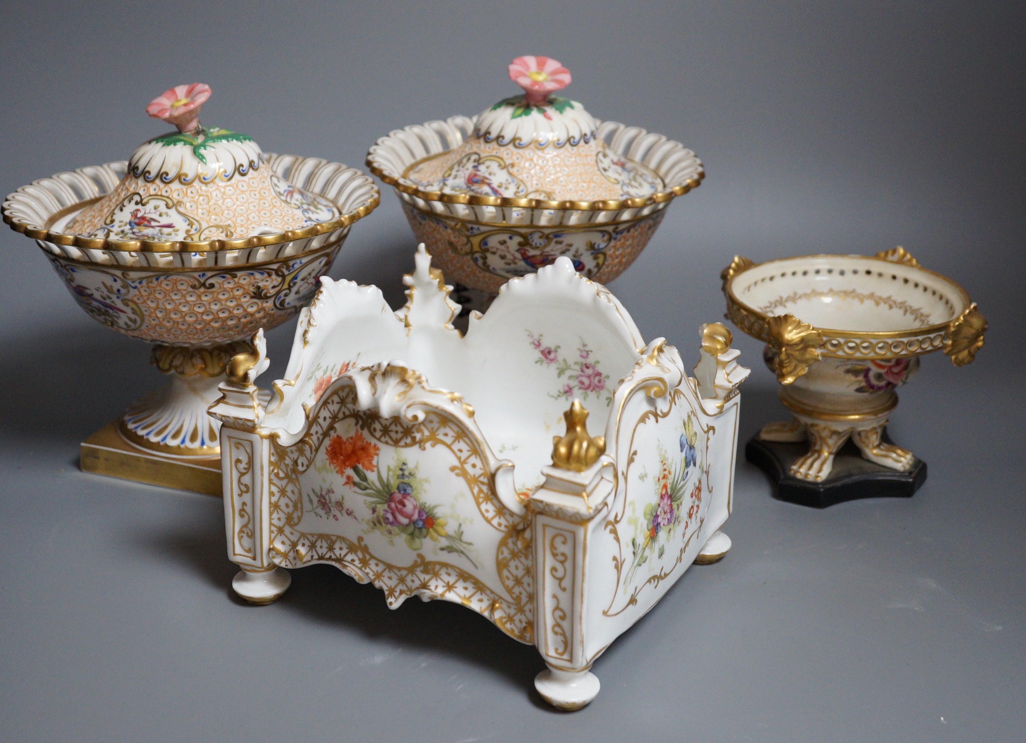 A pair of 19th century continental porcelain tazzas together with a smaller example and planter (4), tallest 19cm